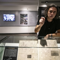 The Japanese photographer Tsukasa Yajima at the history museum of the House of Sharing, a shelter for former \"comfort women\" in Gwangju, South Korea, on July 3 | WOOHAE CHO / THE NEW YORK TIMES