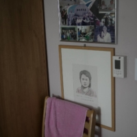 A portrait of Lee Ok-sun in her youth, in her room at the House of Sharing | WOOHAE CHO / THE NEW YORK TIMES