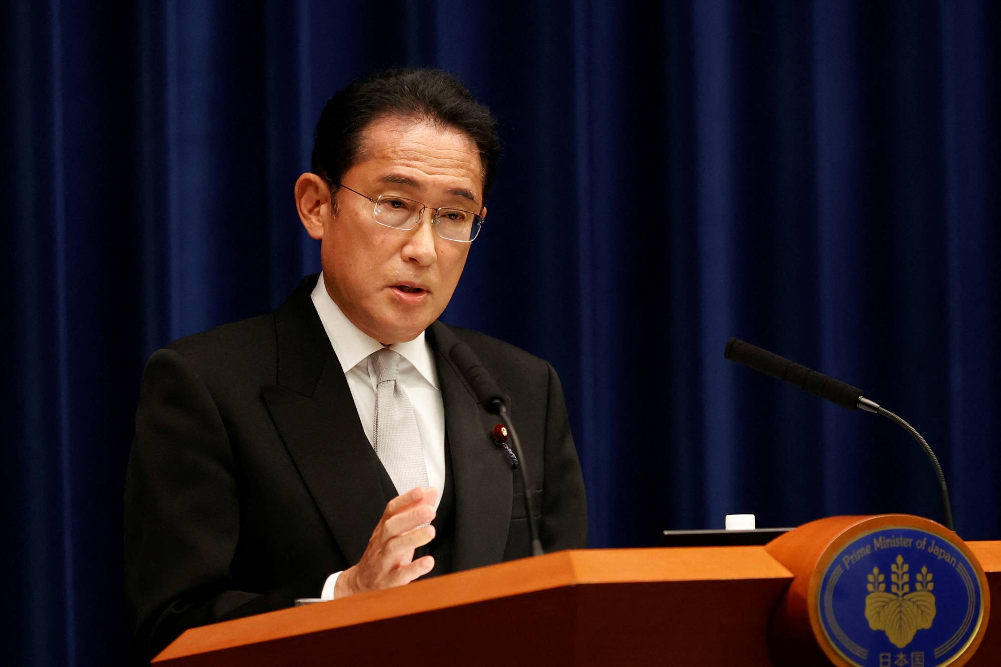 Prime Minister Fumio Kishida speaks during a news conference at the Prime Minister's Office in Tokyo on Aug. 10. | POOL / VIA REUTERS