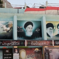 Banners depicting Iran\'s late leader Ayatollah Ruhollah Khomeini (center), Iran\'s Supreme Leader Ayatollah Ali Khamenei (center right) and Lebanon\'s Hezbollah leader Sayyed Hassan Nasrallah in the town of Yaroun, southern Lebanon, on Monday. | REUTERS