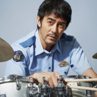 An old-school cop (Hiroshi Abe) finds himself reassigned to the police band after getting too forceful with a crime suspect in “Offbeat Cops.” | © 2022 “OFFBEAT COPS” FILM PARTNERS

