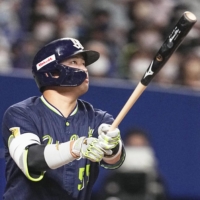 The Swallows\' Munetaka Murakami blasts a home run in the seventh inning on Saturday,  | KYODO 