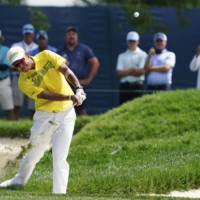 Hideki Matsuyama hits from the rough on the first hole during the final round of the BMW Championship in Wilmington, Delaware, on Sunday. | KYODO