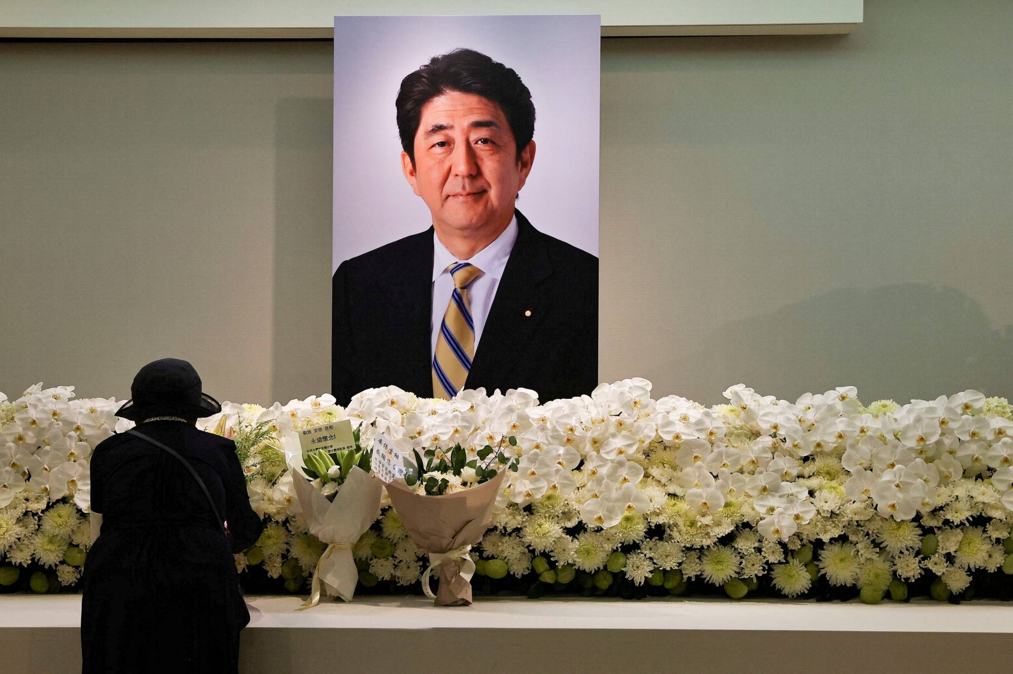 At the onset of former Prime Minister Shinzo Abe's second administration, the expectations were low. However, the perception of him changed over time as a result of his accomplishments in office. | REUTERS 