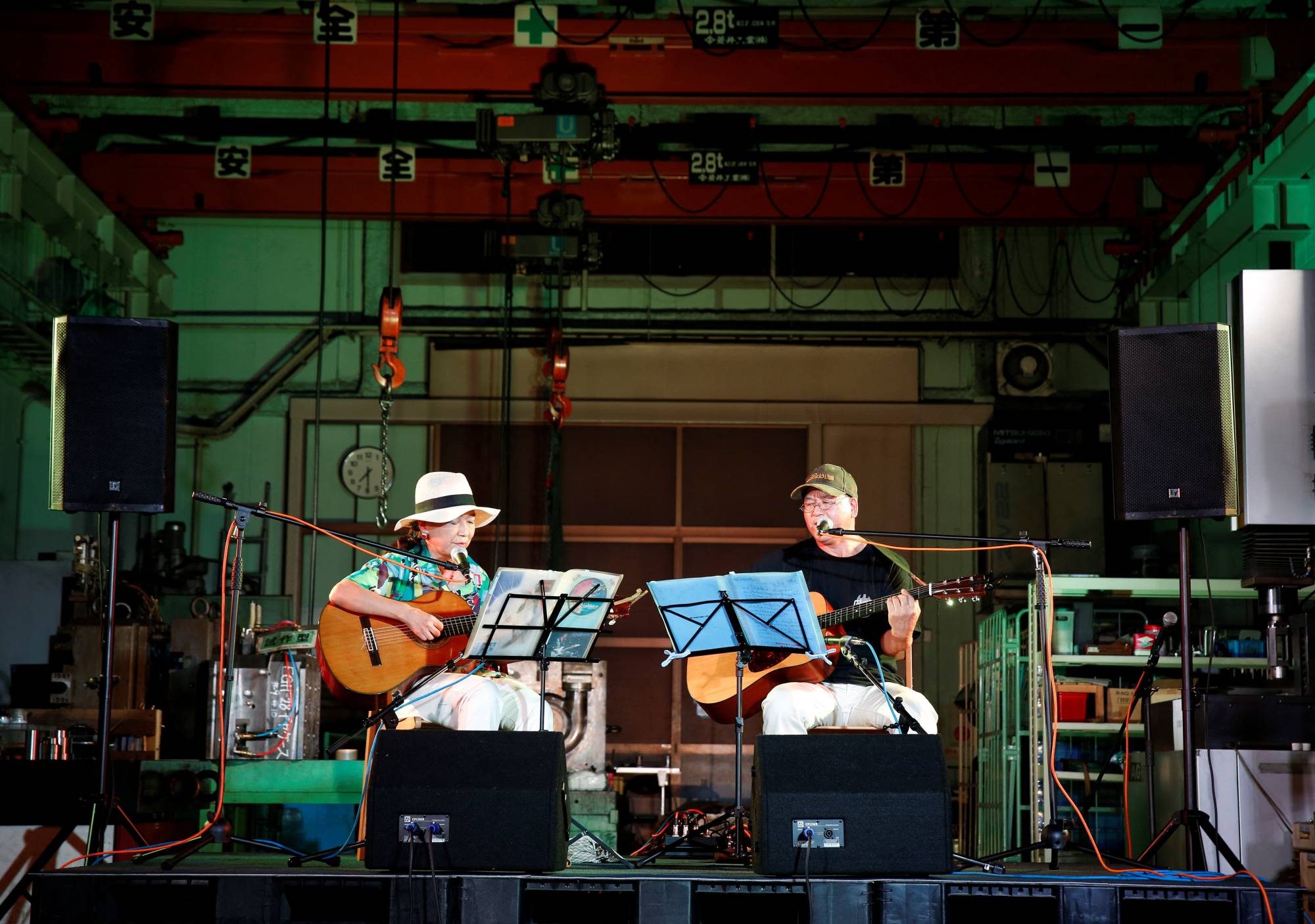 Musicians perform during an event hosted at a factory in Higashiosaka on June 24. | Reuters