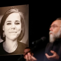Ultranationalist Russian ideologue Alexander Dugin delivers a eulogy during a memorial service Tuesday for his daughter Darya, who was killed in a car bomb attack earlier in the week. | REUTERS