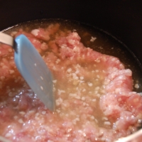 Ground chicken added to simmering tōgan makes for a lovely, savory sauce. | ELIZABETH ANDOH
