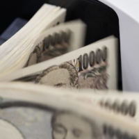 According to data from the Bank of Japan, financial assets held by Japanese households totaled over ¥2 quadrillion as of December, but 54% of that was sitting in basic savings accounts or held as cash. | BLOOMBERG
