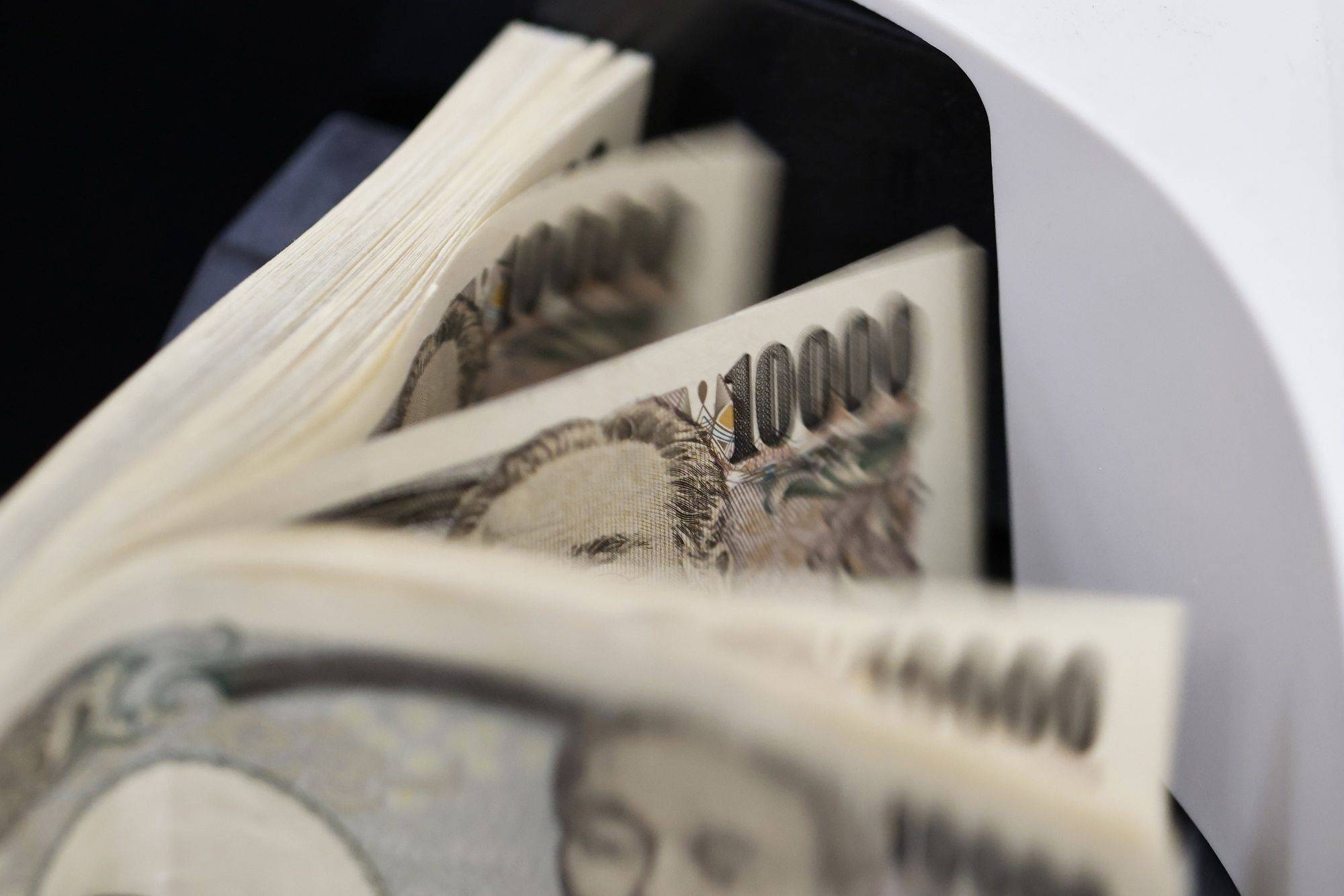 According to data from the Bank of Japan, financial assets held by Japanese households totaled over ¥2 quadrillion as of December, but 54% of that was sitting in basic savings accounts or held as cash. | Bloomberg