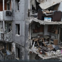 Ukrainian citizens are recording and sharing evidence of destruction in the country, such as this picture taken with a drone showing a bombed apartment building in Borodyanka, near Kyiv.