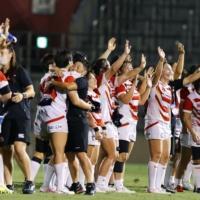 Japan\'s Sakura Fifteen celebrate after their win over Ireland in an international test at Prince Chichibu Memorial Rugby Ground on Saturday. | KYODO