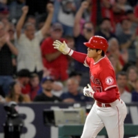 Angels designated hitter Shohei Ohtani rounds third after hitting a two-run home run in the fifth inning against the Yankees in Anaheim, California, on Monday. | USA TODAY / VIA REUTERS