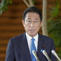 Prime Minister Fumio Kishida speaks to reporters Wednesday at the Prime Minister\'s Office as he returned to work after recovering from a COVID-19 infection. | KYODO