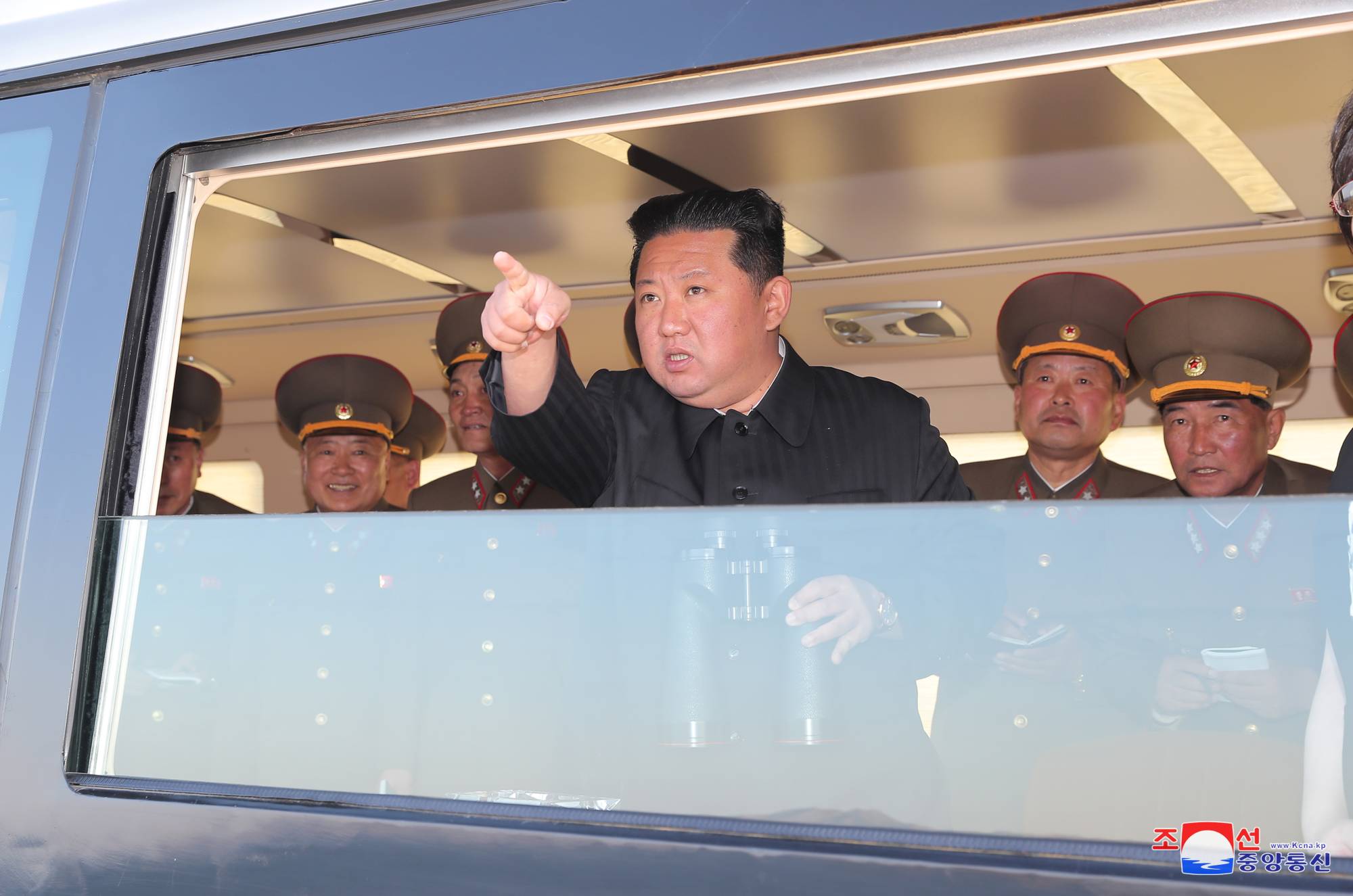Kim watches the test-firing of a new weapon aimed at 'enhancing the efficiency in the operation of tactical nukes” in a photo released in April. | KCNA / VIA REUTERS