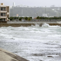 High waves hit the coast in Yonabaru, Okinawa Prefecture, on Thursday as powerful Typhoon Hinnamnor approached the prefecture. | KYODO