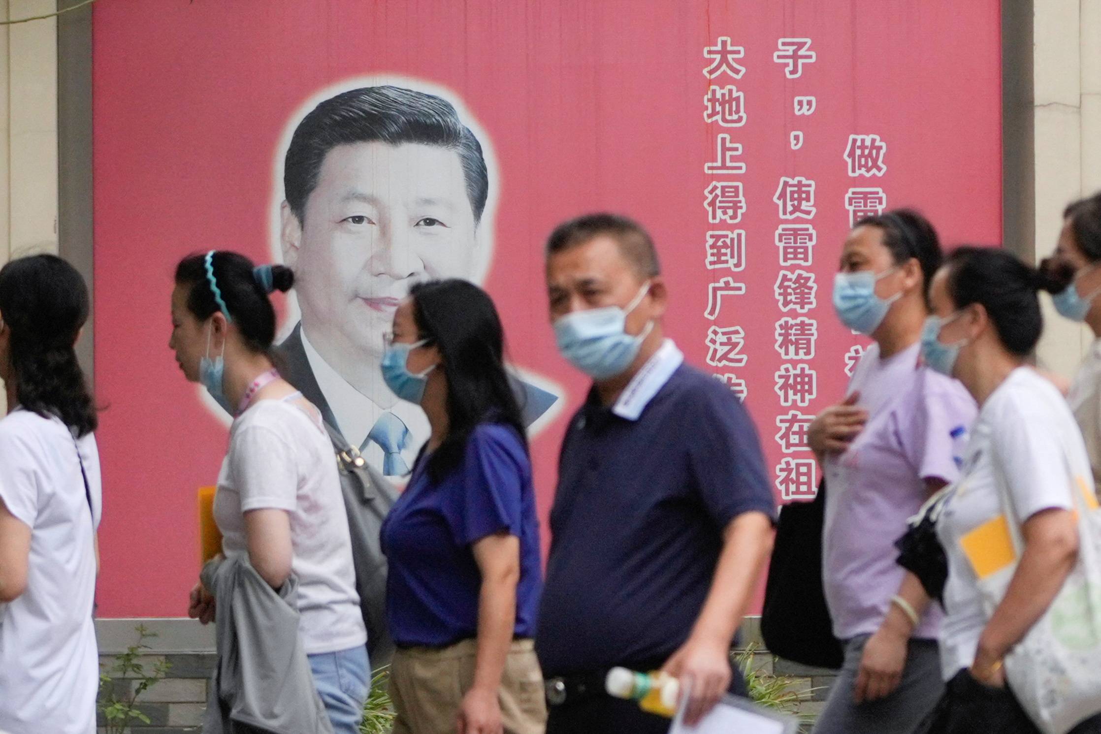 A portrait of Chinese President Xi Jinping in Shanghai on Wednesday | REUTERS
