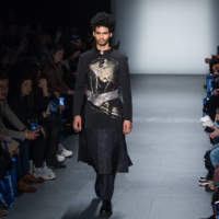 A model wears Hiromi Asai\'s silk coat featuring a gold phoenix in 2020 | COURTESY OF HIROMI ASAI