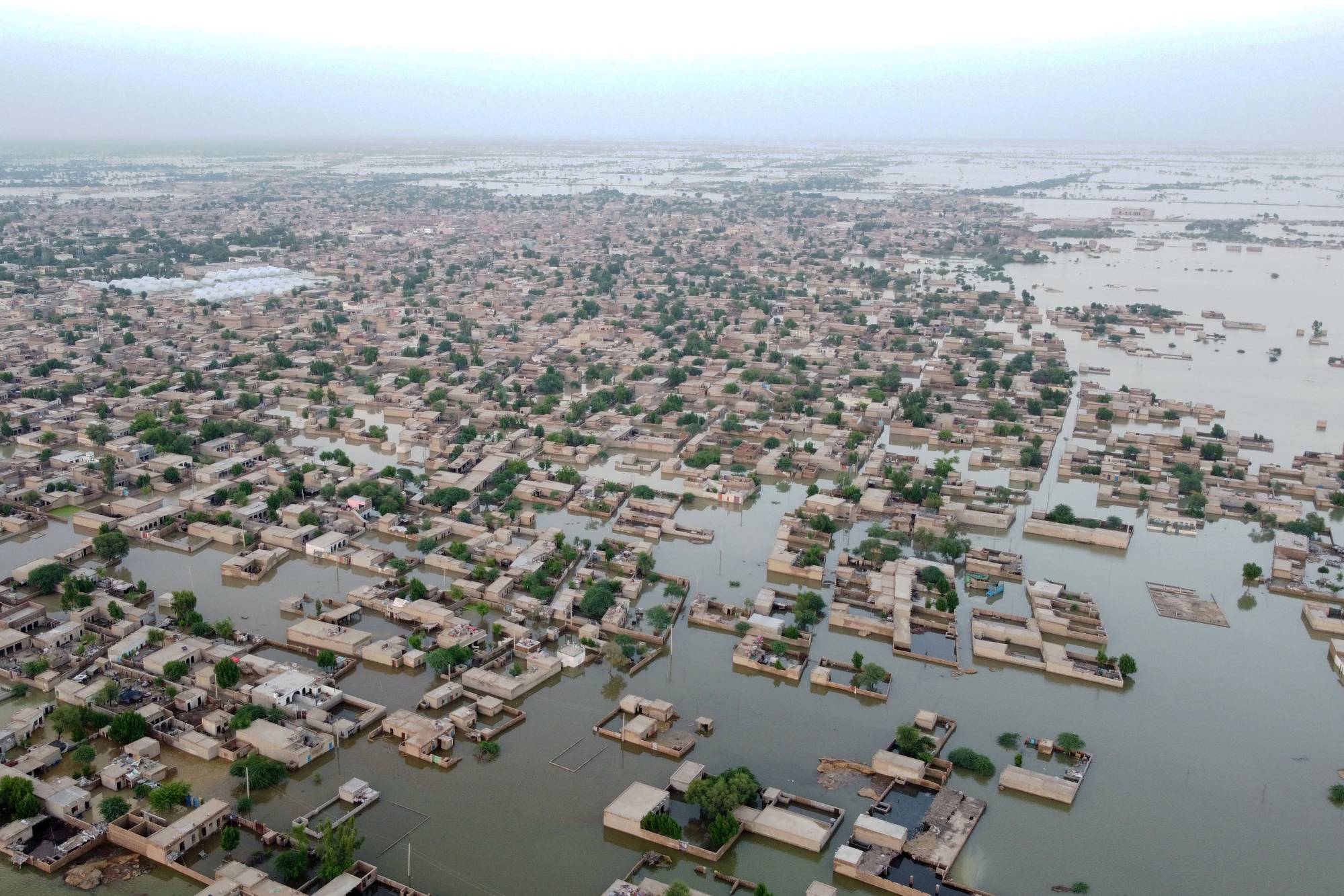 Flooded residential areas after heavy monsoon rains in Dera Allah Yar town of Jaffarabad district, Balochistan province, Pakistan, on Thursday. | AFP-Jiji