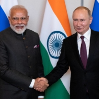 Indian Prime Minister Narendra Modi (left) and Russian President Vladimir Putin. The two leaders\' nations are in a crucial position for China, both occupying positions in BRICS and the Shanghai Cooperation Organization. | POOL / VIA REUTERS