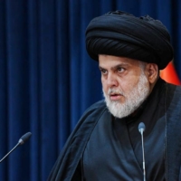 Iraqi Shiite cleric Moqtada al-Sadr speaks during a news conference in Najaf, Iraq, on Aug. 30.  | SADR OFFICE / VIA REUTERS 