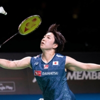 Akane Yamaguchi hits a return against An Se-young during the women\'s singles final at the Japan Open in Osaka on Sunday. | AFP-JIJI