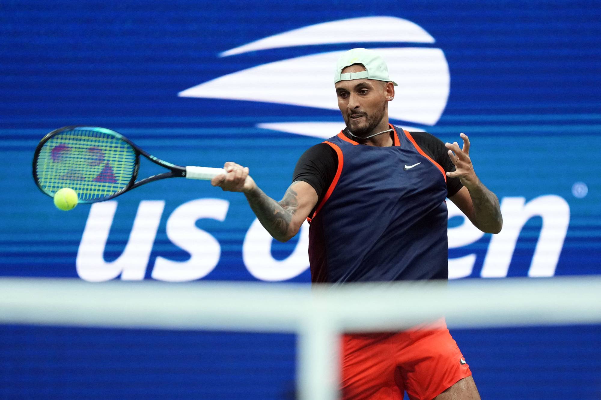 Nick Kyrgios hits a shot against No. 1 Daniil Medvedevduring the fourth round of the U.S. Open in New York on Sunday. | USA TODAY / VIA REUTERS
