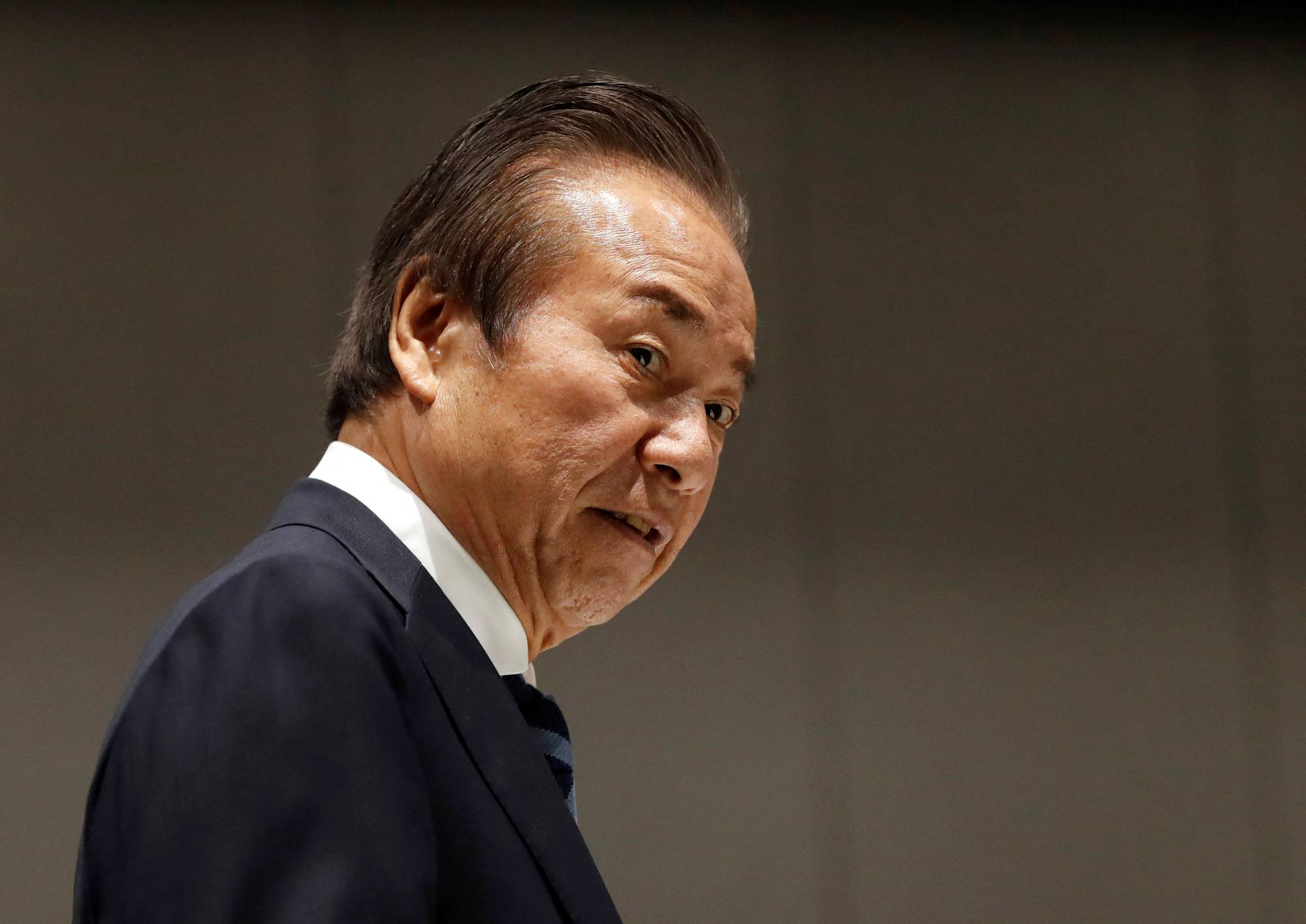 Then-Tokyo Organising Committee board member Haruyuki Takahashi arrives for a Games executive board meeting in Tokyo in March 2020. | POOL / VIA REUTERS