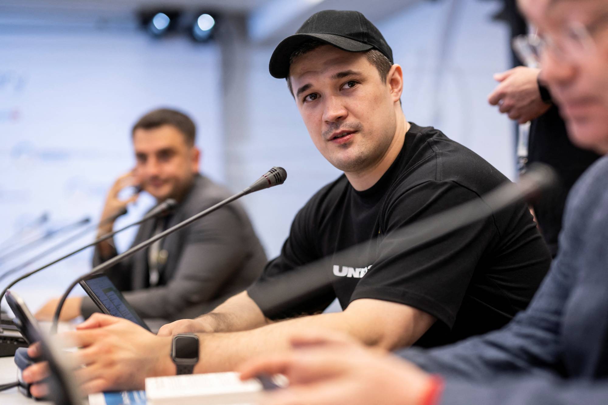 Ukraine's digital transformation minister Mykhailo Fedorov in Lugano, Switzerland, on July 4. After the invasion of Ukraine began, Fedorov called for distributed denial of service cyberattacks on Russian companies and organizations. | Pool / Via Reuters