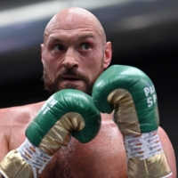 WBC heavyweight champion Tyson Fury has challenged fellow Briton Anthony Joshua to a title fight. | AFP-JIJI