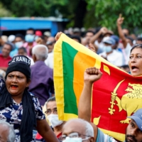 Protesters at an anti-government rally in Colombo, Sri Lanka, on Aug. 6. The country\'s borrowings are so complex that estimates of the total range anywhere from $85 billion to well over $100 billion. | REUTERS