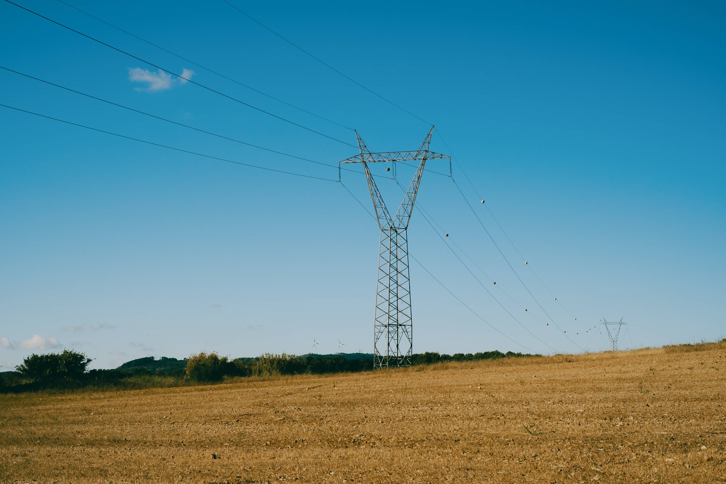 Power lines near a wind turbine farm in Sintra, Portugal. | Matilde Viegas / The New York Times