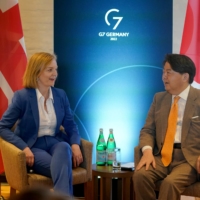 Liz Truss with Japanese Foreign Minister Yoshimasa Hayashi at the G7 Foreign Ministers Summit in Germany on May 12. Now Britain\'s Prime Minister, Truss may label China a “threat” to U.K. interests and seek closer ties to other Indo-Pacific countries such as Japan, India, Australia and South Korea. | REUTERS