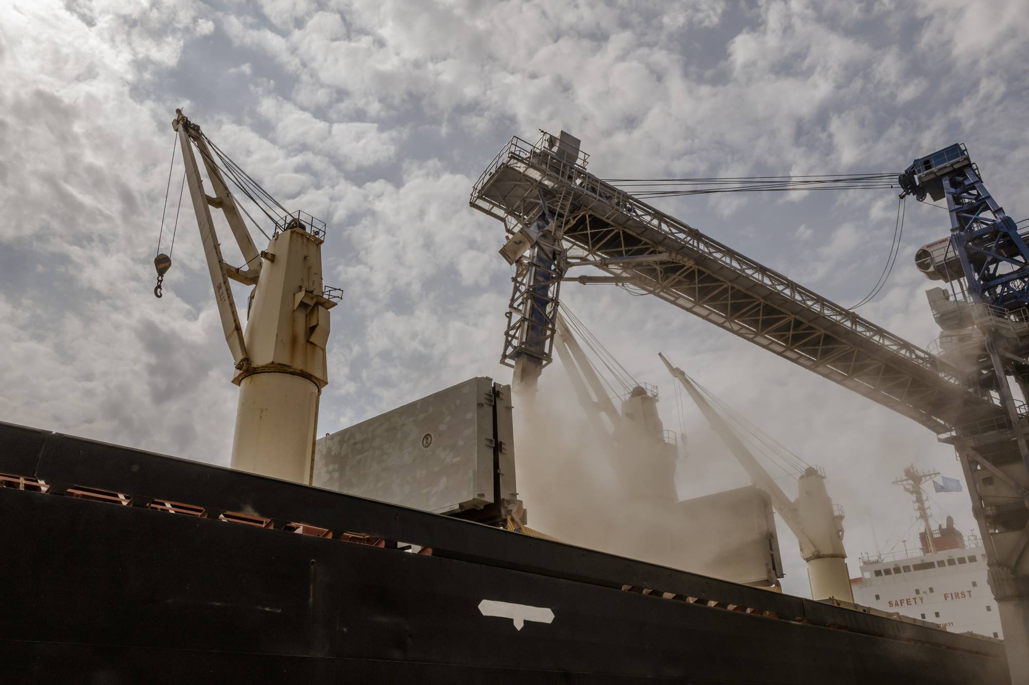 The Brave Commander, a cargo vessel chartered by the World Food Program, is loaded with wheat grain at a port near Odesa, Ukraine, on Aug. 14. | Daniel Berehulak / The New York Times