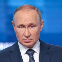 Russian President Vladimir Putin attends the plenary session of the 2022 Eastern Economic Forum in Vladivostok, Russia, on Wednesday. | TASS HOST PHOTO AGENCY / VIA REUTERS
