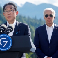 Prime Minister Fumio Kishida speaks next to German Chancellor Olaf Scholz and U.S. President Joe Biden during the first day of the Group of Seven leaders\' summit at Bavaria\'s Schloss Elmau castle, near Garmisch-Partenkirchen, Germany, on June 26. | REUTERS