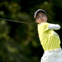 Haruka Kawasaki hits her shot off the second tee during the final round of the JLPGA Championship Konica Minolta Cup in Joyo, Kyoto Prefecture, on Sunday. | KYODO