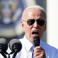 U.S. President Joe Biden delivers remarks as he celebrates the enactment of the \"Inflation Reduction Act of 2022,\" which he signed into law in August, at the White House in Washington on Tuesday. | REUTERS