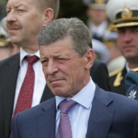 Kozak (center) waits for the arrival of Putin in Sevastopol, Crimea, in May 2014. | REUTERS