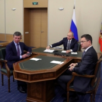 Putin, then-Deputy Prime Minister Dmitry Kozak and then-Energy Minister Alexander Novak take part in a ceremony launching Gazprom\'s Power of Siberia gas pipeline to China via a video link in Sochi, Russia, in December 2019. | KREMLIN / SPUTNIK / VIA REUTERS 