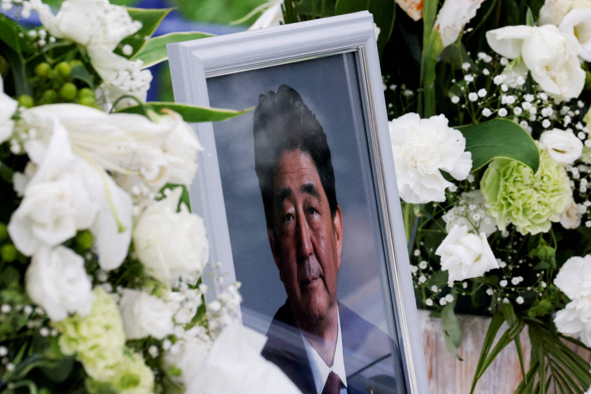 A picture of the late former Prime Minister Shinzo Abe in Tokyo in July | REUTERS