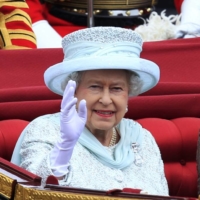 Britain\'s Queen Elizabeth II leads a carriage procession through London en route to Buckingham Palace during her Diamond Jubilee in June 2012. | REUTERS