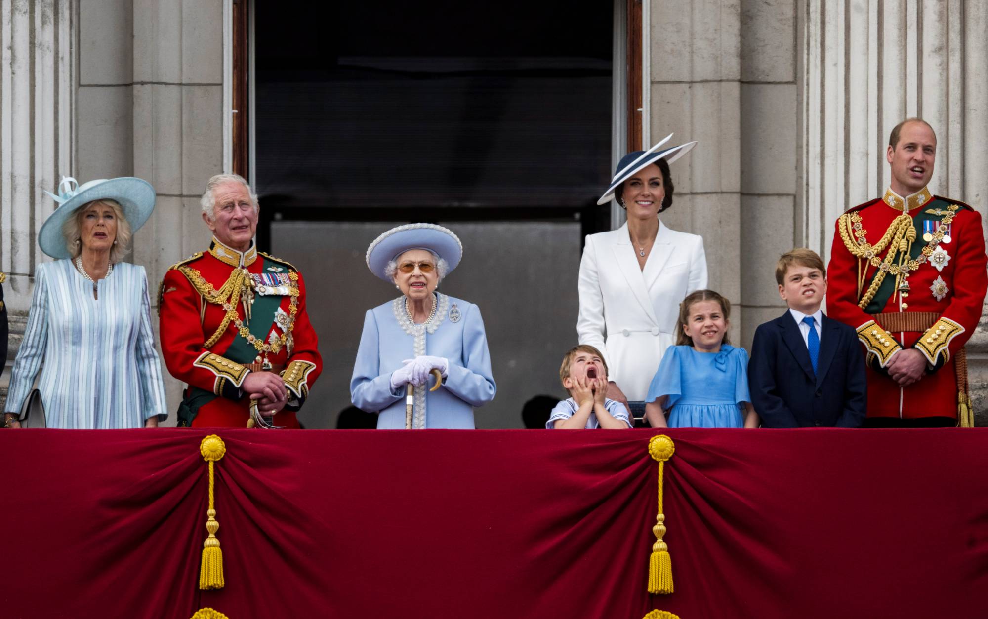 Britain's Queen Elizabeth II and members of the royal family celebrate her platinum jubilee from Buckingham Palace's balcony on June 2. | Pool / via REUTERS