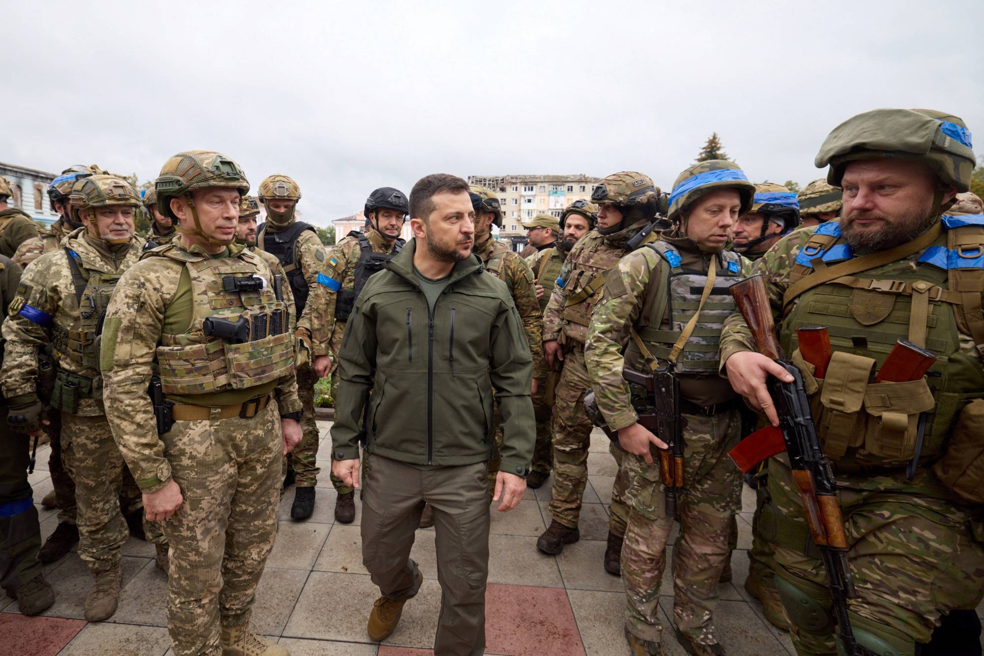 Ukrainian President Volodymyr Zelenskyy visits the town of Izium on Wednesday. The area was recently liberated by the Ukrainian military during counteroffensive operations against occupying Russian forces. | REUTERS 