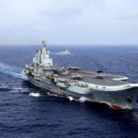 China\'s Liaoning aircraft carrier takes part in a military drill in the western Pacific Ocean in 2018. | REUTERS 