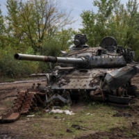 A destroyed Russian tank in the town of Izium, recently liberated by Ukrainian Armed Forces, in Kharkiv region, Ukraine, on Tuesday. | REUTERS