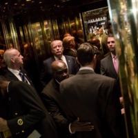 Donald Trump takes an elevator at Trump Tower in New York during his presidential campaign in 2015. | ERIC THAYER / THE NEW YORK TIMES
