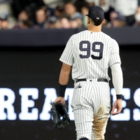 Judge walks to his position in right field during the fifth inning against the Boston Red Sox at Yankee Stadium on Thursday.  | USA TODAY / VIA REUTERS