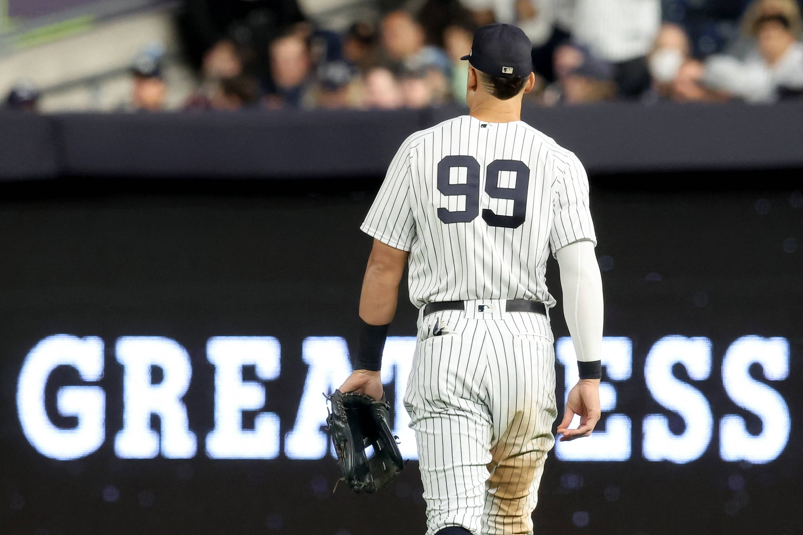 Judge walks to his position in right field during the fifth inning against the Boston Red Sox at Yankee Stadium on Thursday.  | USA TODAY / via Reuters