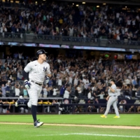 Yankees right fielder Aaron Judge rounds the bases after hitting his 60th home run of the season during the ninth inning against the Pittsburgh Pirates at Yankee Stadium on Tuesday. | USA TODAY / VIA REUTERS