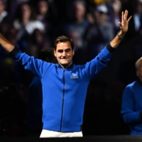 Roger Federer at fans at the end of his last match on Friday in London.  | REUTERS